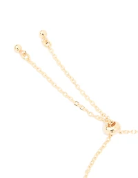 Bracelet à bascule en pavé cubique en zircone plaqué or avec la lettre L