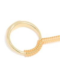 Ajusteur d’anneaux en spirale en or