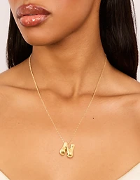 Collier imperméable en acier inoxydable plaqué or avec une grande lettre N à bulles