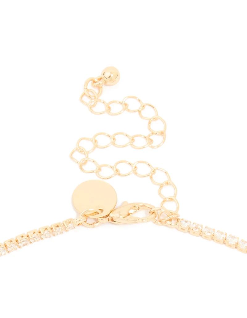 Collier en Y en zircone cubique en or, serti de lunettes délicates.