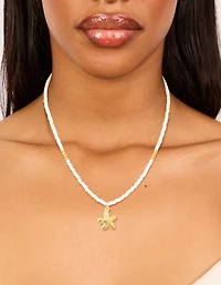 Collier étoilé de mer imperméable plaqué or en acier inoxydable à perles blanches