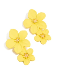 Boucles d’oreilles asymétriques à double fleur jaune dorée