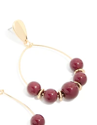 Boucles d’oreilles perlées dorées rouge foncé