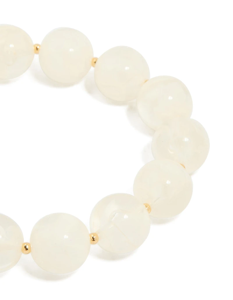 Bracelet acrylique perlé en crème dorée