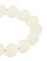 Bracelet acrylique perlé en crème dorée