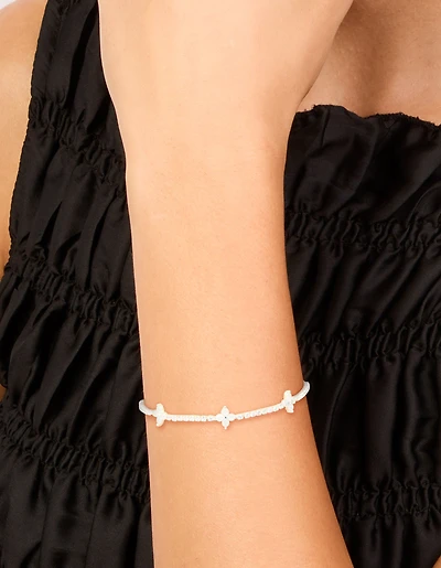 Bracelet à bascule en fleur de pierre en zircone cubique plaqué argent