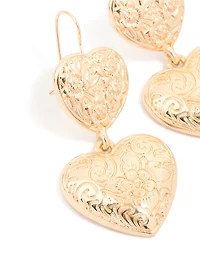 Boucles d’oreilles en forme de cœur doré à double texture