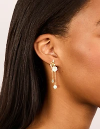 Boucles d’oreilles tombantes en chaîne en zircone et feuilles de zircone plaquées or