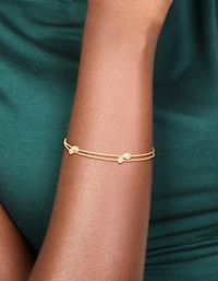 Bracelet à double chaîne en zircone cubique plaqué or