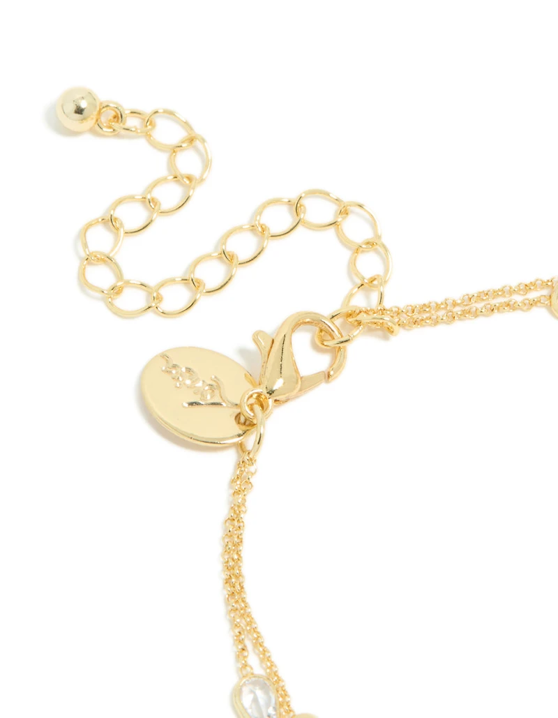 Bracelet à double chaîne en zircone cubique plaqué or