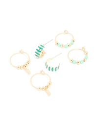 Pack 3 boucles d’oreilles Huggie dorées vertes perlées et feuilles