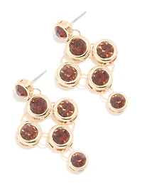 Boucles d’oreilles rondes dorées brun foncé à sertissage de lunettes