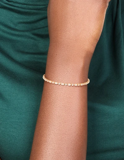 Bracelet de tennis alterné rond et ovale en zircone cubique plaqué or