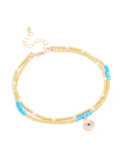 Bracelet de cheville doré du mal-œil