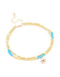 Bracelet de cheville doré du mal-œil