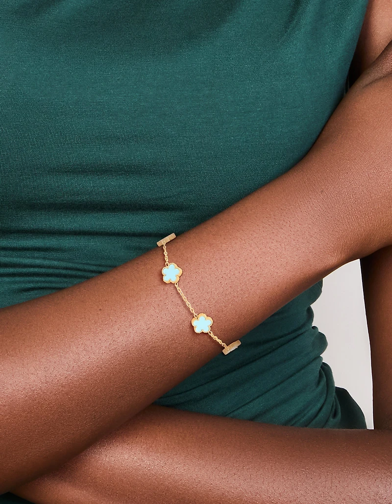 Bracelet breloque imperméable en acier inoxydable plaqué or en forme de fleur de pétales bleu clair