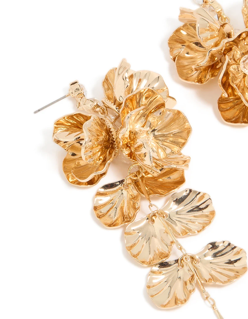Boucles d’oreilles longues florales dorées