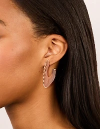 Boucles d’oreilles à cerceaux dorés en brun doré