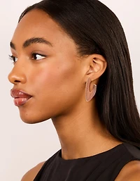 Boucles d’oreilles à cerceaux dorés en brun doré