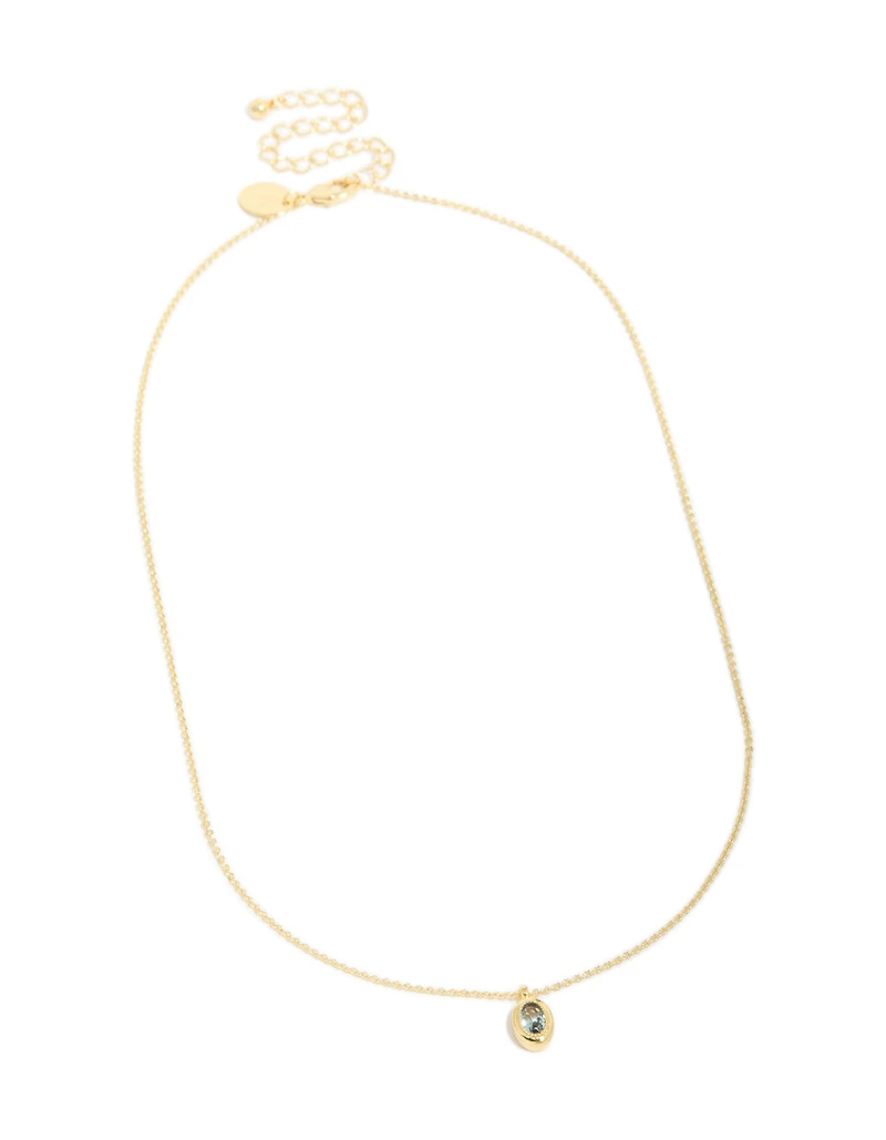 Collier de pierre de naissance en laiton aquamarine en zircone cubique de marche en laiton doré