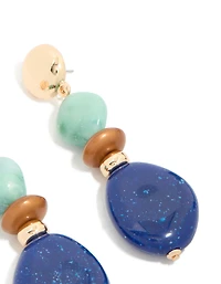 Boucles d’oreilles en acrylique en perles dorées claires et bleu foncé