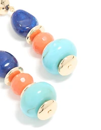 Boucles d’oreilles en acrylique perlées dorées et orange