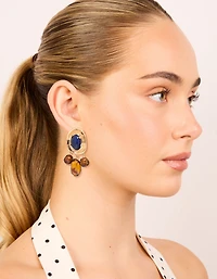 Boucles d’oreilles en forme d’acrylique bleu foncé et médaillon perlé brun