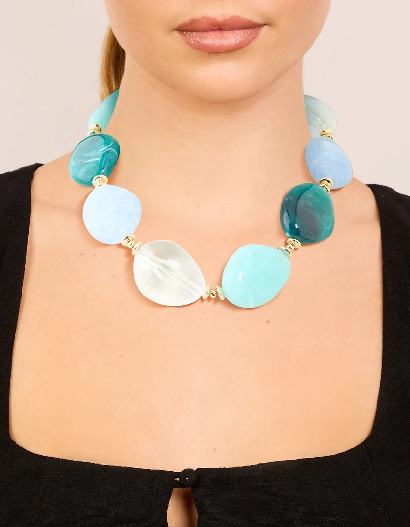 Grands colliers en acrylique en acrylique bleus