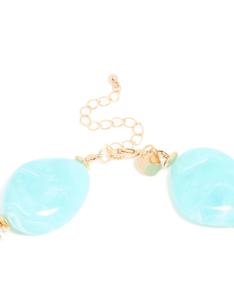 Grands colliers en acrylique en acrylique bleus