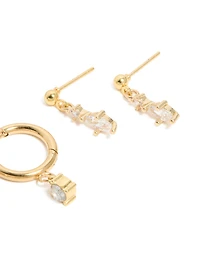 Huggie et boucles d’oreilles tombantes en zircone cubique en acier inoxydable imperméables plaquées or