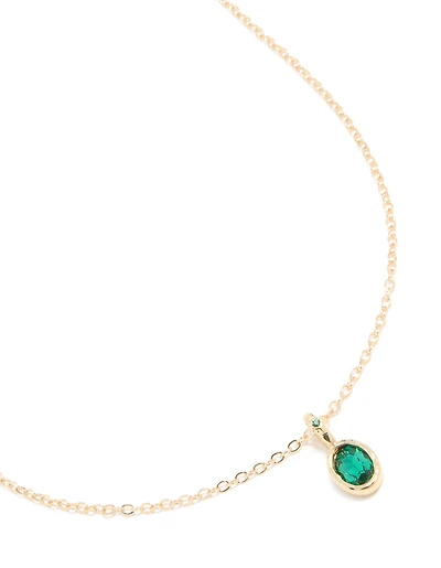 Collier pendentif rond diamant en émeraude dorée