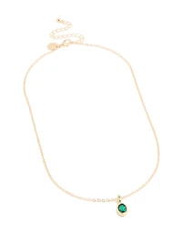 Collier pendentif rond diamant en émeraude dorée