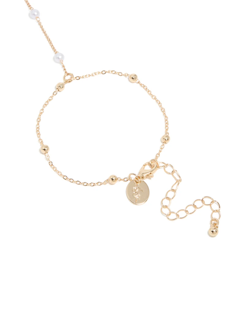 Perle d’or et chaîne de main en boule