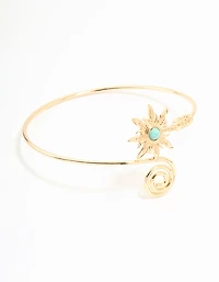 Menotte de bras en tourbillon céleste en pierre turquoise dorée