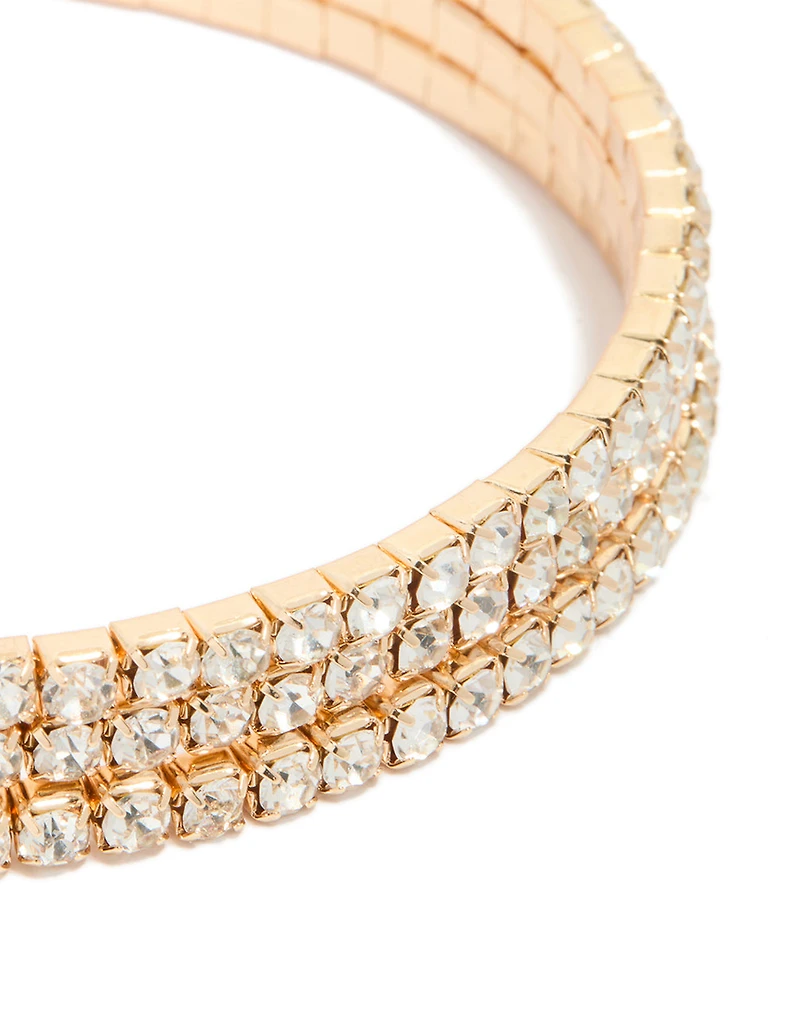 Manchette ronde de bras en diamant dorée