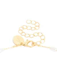 Collier croix cubique en zircone et perles plaqués or