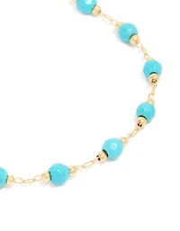 Bracelet en pierres semi-précieuses turquoise plaquées or