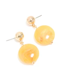 Boucles d’oreilles en forme de cercle en marbre doré et jaune