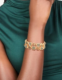 Bracelet extensible en acrylique brun doré et strass