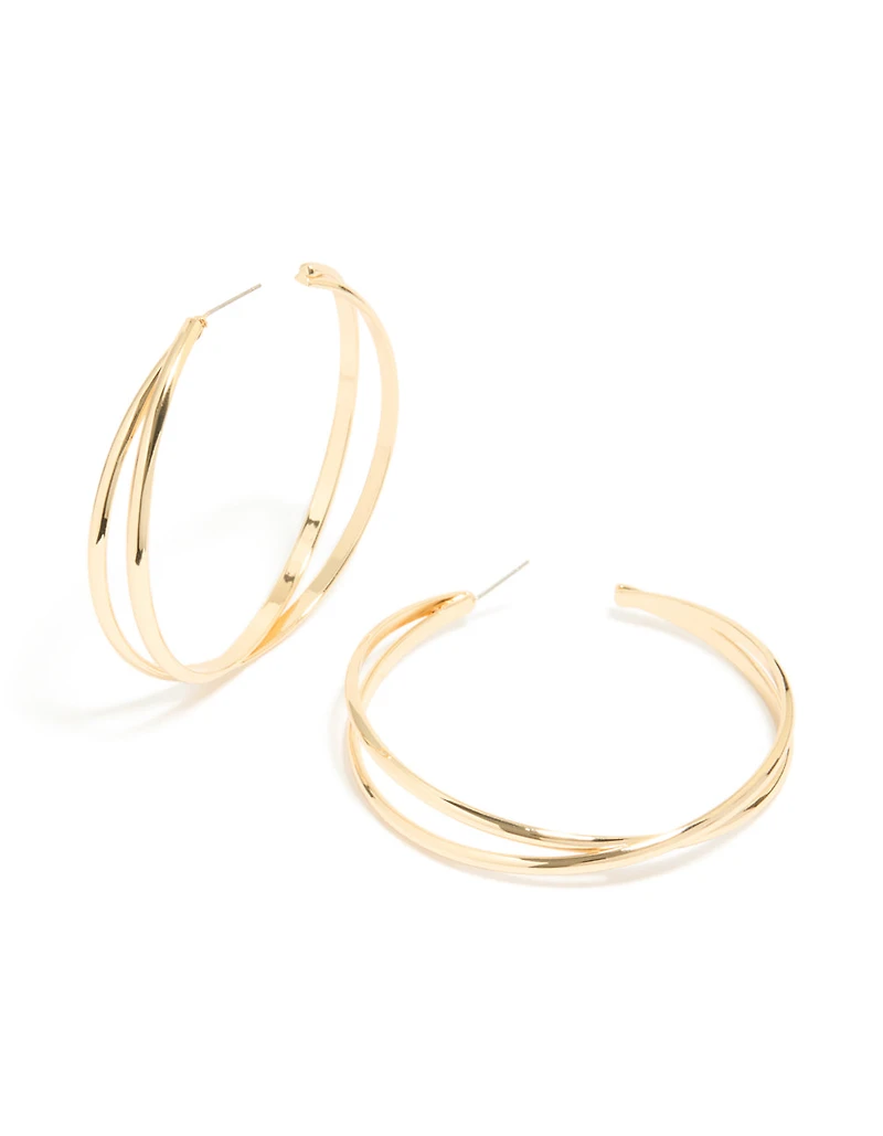 Grandes boucles d’oreilles en croix dorées
