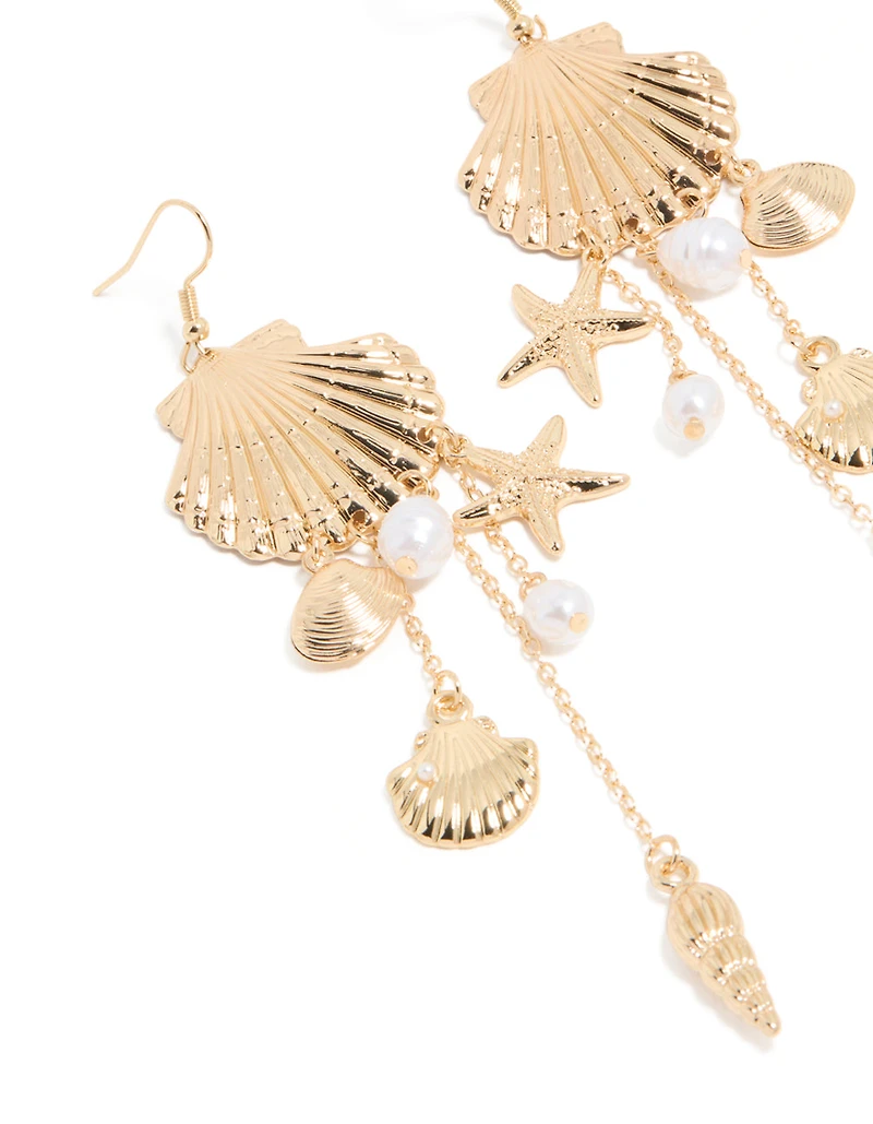 Boucles d’oreilles tombantes en perles d’or et multi-coquillages