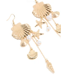 Boucles d’oreilles tombantes en perles d’or et multi-coquillages