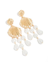 Boucles d’oreilles tombantes en coquillage nervuré doré et perles