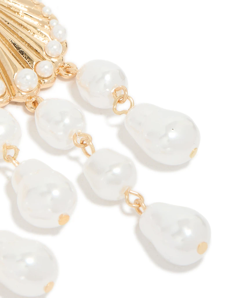 Boucles d’oreilles tombantes en coquillage nervuré doré et perles