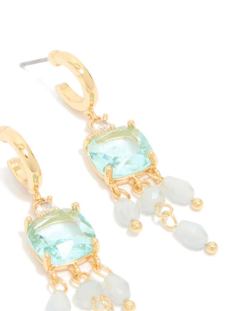 Boucles d’oreilles en zircone cubique bleu plaqué or et pierres avec détail de drop carré