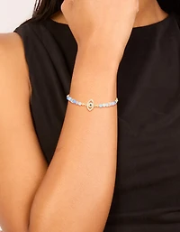 Bracelet à bascule en zircone cubique bleu plaqué or et bracelet à perles bleues