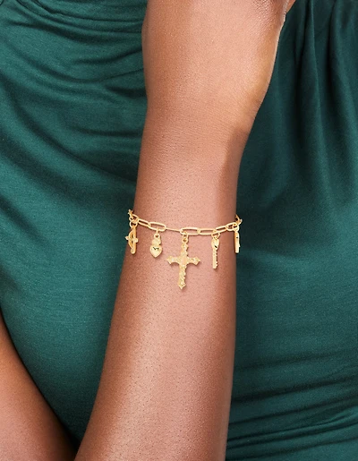 Bracelet à breloques croix et cœur plaqués or