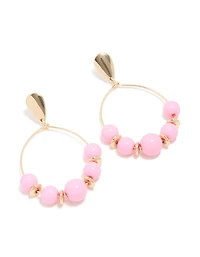 Boucles d’oreilles rondes perlées roses dorées