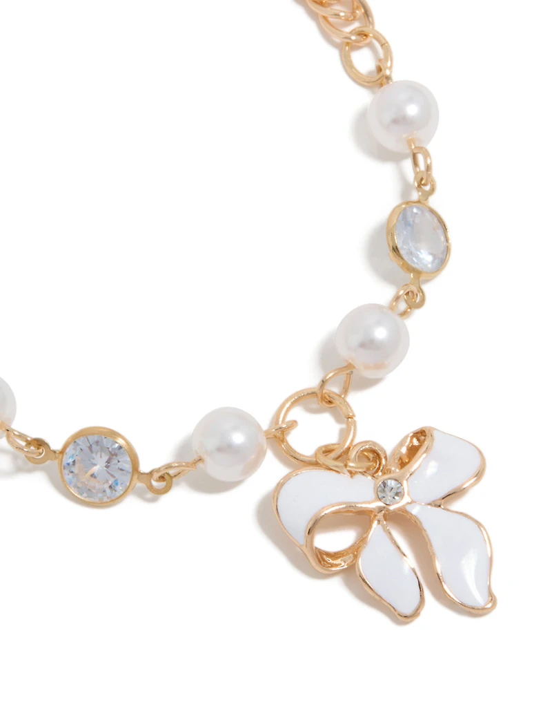 Gold Pearl & Bow Charm Bracelet