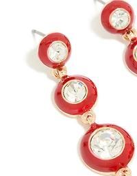 Boucles d’oreilles tombantes en diamant transparent doré et en émail rouge